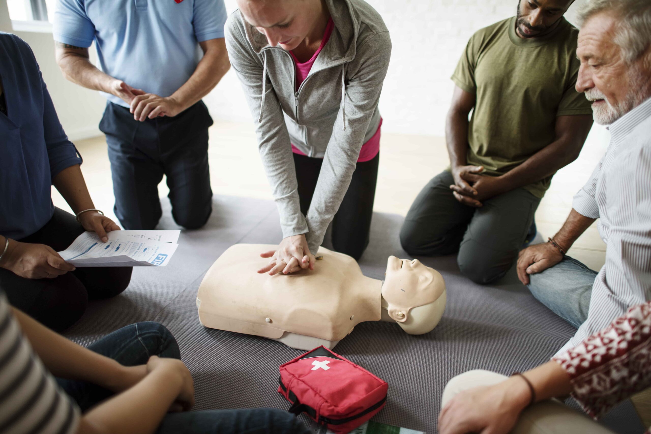 group-diverse-people-cpr-training-class-min